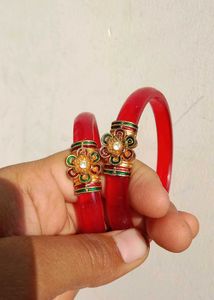 Elegant Red Bangles with Gold Accent