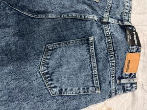 Stylish Ripped Wide-Leg Denim Shorts