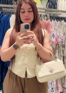 Embellished Collared Sleeveless Top