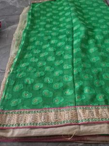 Vibrant Green Paisley Saree with Gold Border