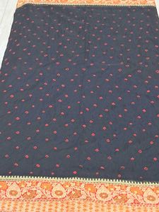 Elegant Black Saree with Red Border