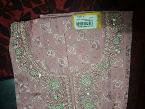 Elegant Pink Embroidered Kurta Set material
