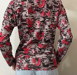 Graphic Print Distressed Long Sleeve Top