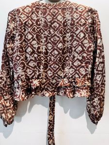 Beautiful Brown Printed Peplum Top – Perfect for F