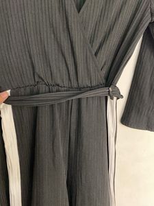 Chic Black Jumpsuit with White Stripes
