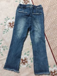 Blue Denim Flare Jeans with Raw Hem