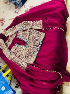 Maroon Lengha With Elaborate Detail