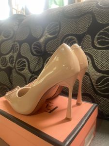 Elegant Nude Patent Bow Pumps