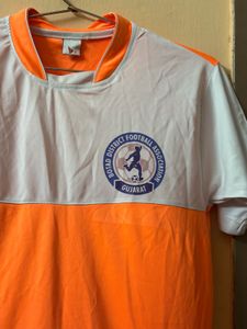 orange jersey with shorts