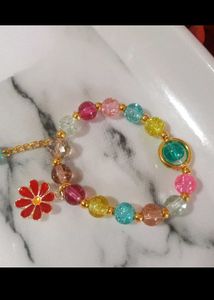 Colorful Beaded Bracelet with Flower Charm