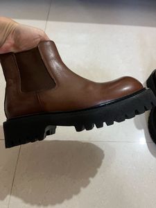 Brown Leather Chelsea Boots. Heavy sole.