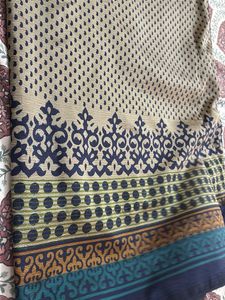 Elegant Beige Saree with Paisley Print