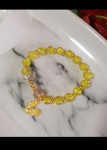 Colorful Beaded Bracelet with Flower Charm