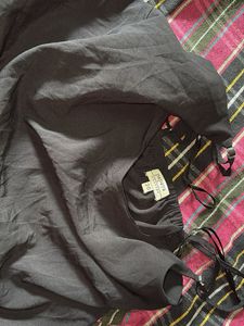 a black casual women’s top from Papaya weekend