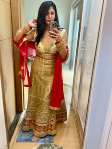Stunning Gold & Red Embellished Lehenga Choli