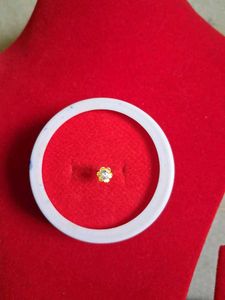 Gold Flower Nose Pin as earpressing