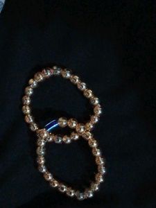 Gold Beaded Bracelet with Blue Accent