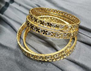 Elegant Gold Tone Flower Design Bangles