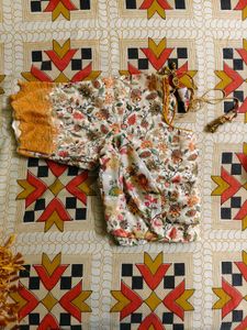 Elegant Mustard Satin Saree with Floral Blouse