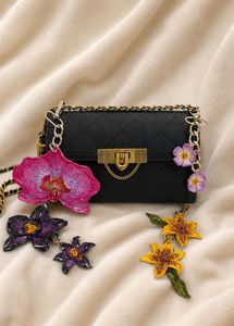 Handsculpted, hand painted, Orchid BAGCHARM