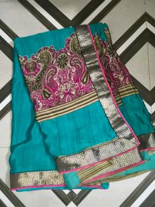 Elegant Teal Saree with Paisley Border