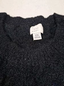 Black shiny woolen top