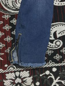 Distressed Blue Denim Jeans