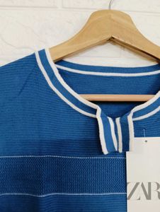 Stylish Blue Top with White Accents