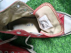 Red Converse High-Top Sneakers