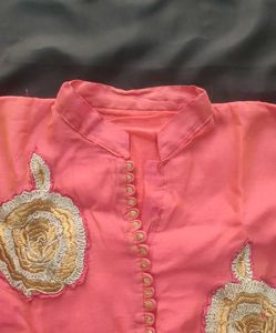 Elegant Pink Kurta with Embroidered Motifs