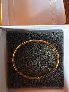 Elegant Gold Bracelet with Stones