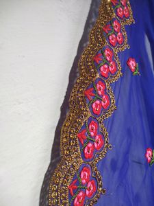 Blue Saree With Flowers Design