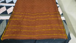 Elegant Brown Saree with Golden Accents
