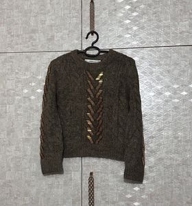 Zara sweater with gold-tone embellishments.