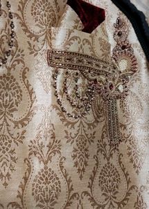 Sherwani- Golden With Maroon Highlights And Button