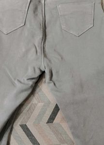 Grey women jeans with light green top