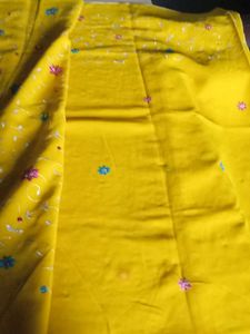 Vibrant Yellow saree with blowse  Embellishments