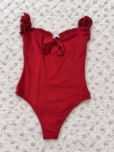 Chic Red Ruffled Bodysuit with Bow Detail