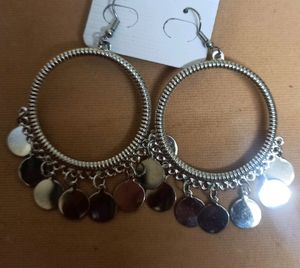 beautiful dangling silver earrings.