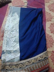 Elegant Blue Saree with White Lace