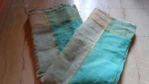 Beautiful Teal Saree with Intricate Embroidery