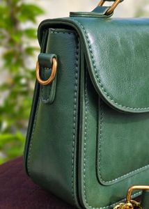 Chic Green Handbag with Gold Accent