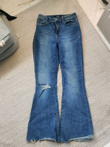 Blue Flare Jeans with Distressed Knee