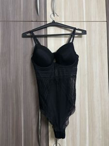 22 H&M Trimmed Patten Bodysuit