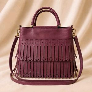 Stylish Burgundy Fringed Handbag