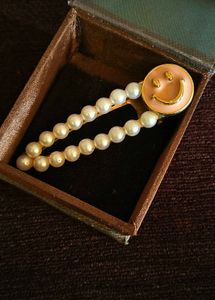 Pearl Smiley Face Hair Clip
