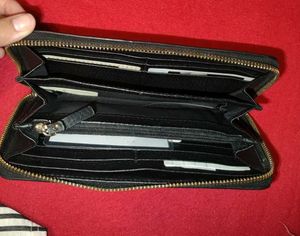 Kate Spade Black Embossed Floral Wallet