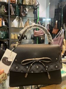 Chic Black Handbag with Bow Detail