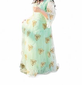 Elegant Pastel Gown with Golden Embroidery