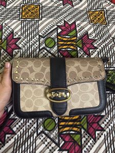 Signature Canvas sling Bag